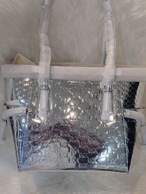 Michael Kors Silver Metallic MK Embossed Tote